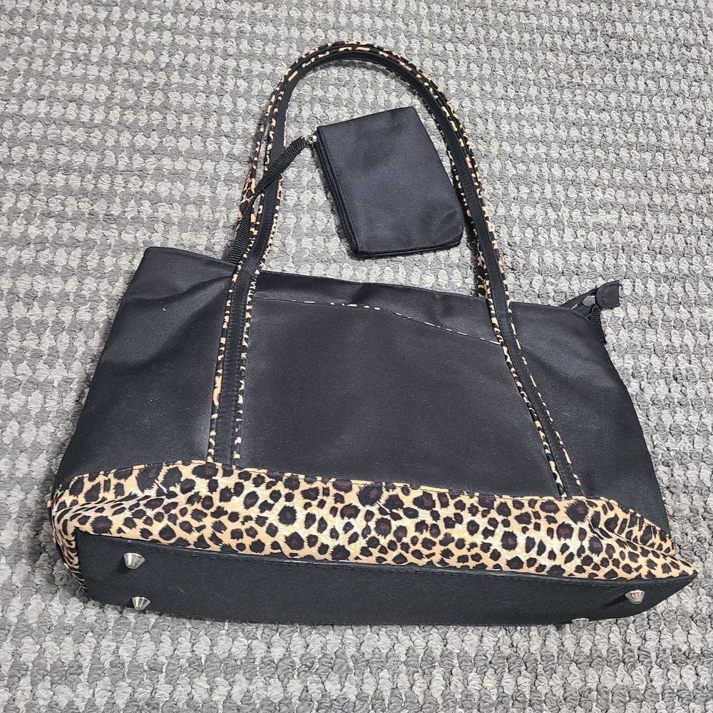 Black and Leopard Tote Bag With Attached Wristlet needs repaired